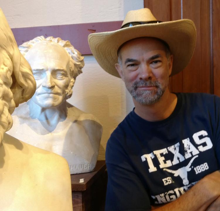 Author pictured with bust of Arthur Schopenhauer